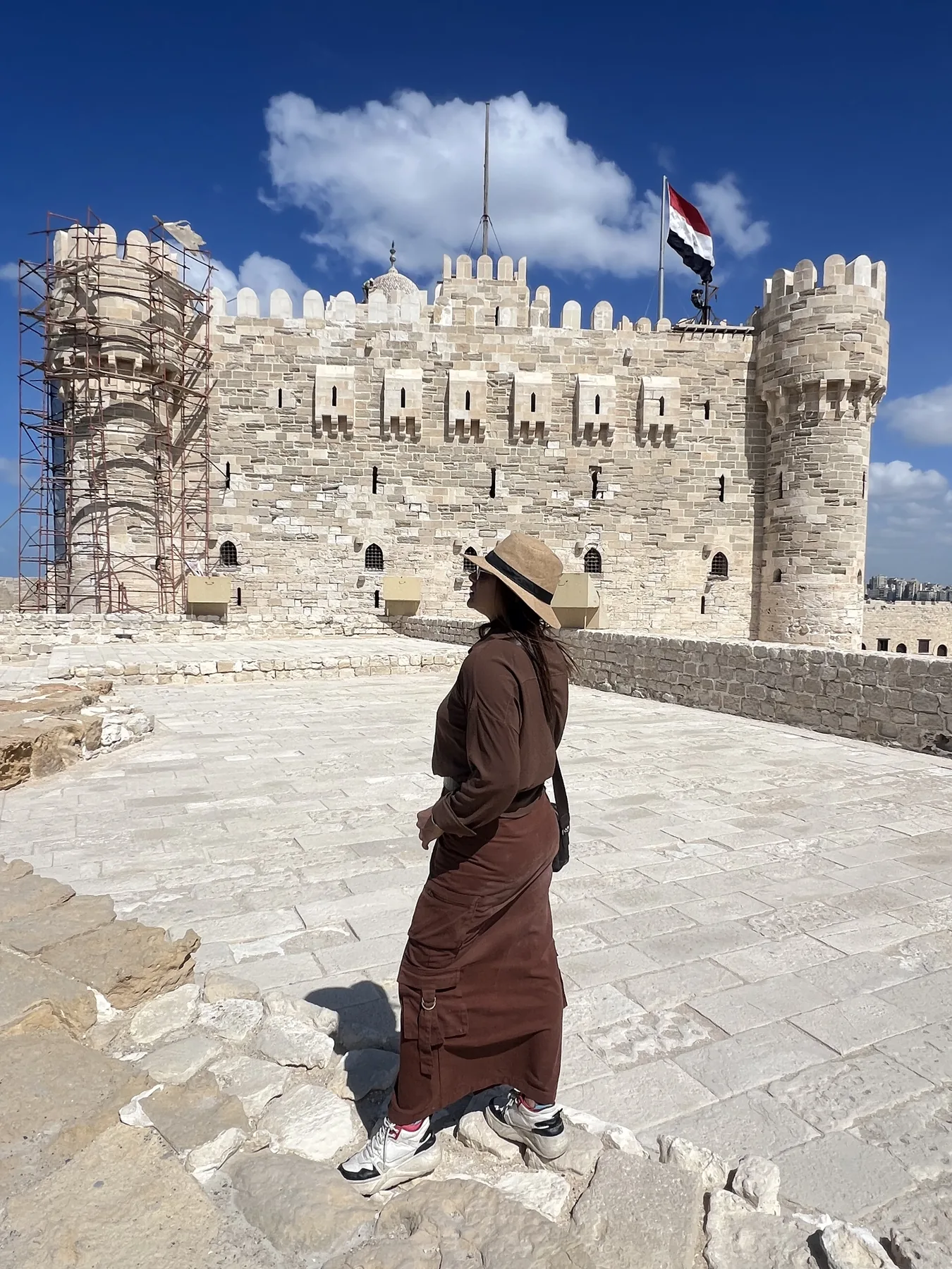 Traveler visiting the courtyard of the Citadel of Qaitbay in Alexandria